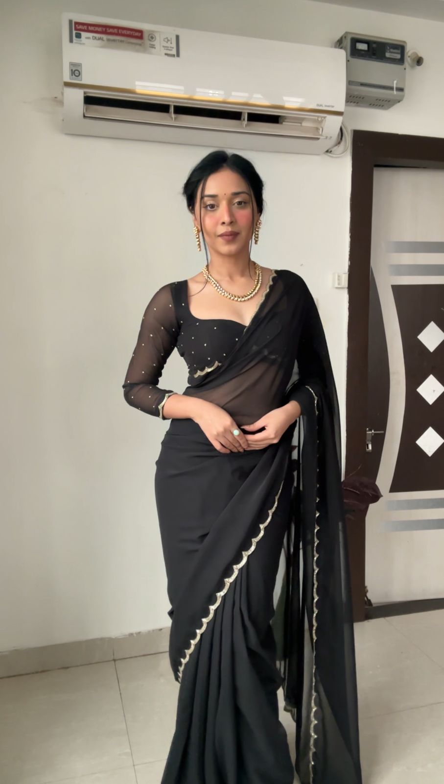 Black Color, Featuring A Scalloped Border Georgette Ready To Wear Saree With Stitched Blouse