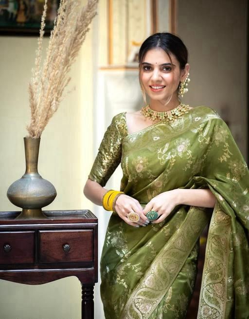 Olive Green Banarasi  Jacquard Lichi Silk Saree with Gold Zari Borders  Regal Ethnic Charm for Festive & Wedding Occasions
