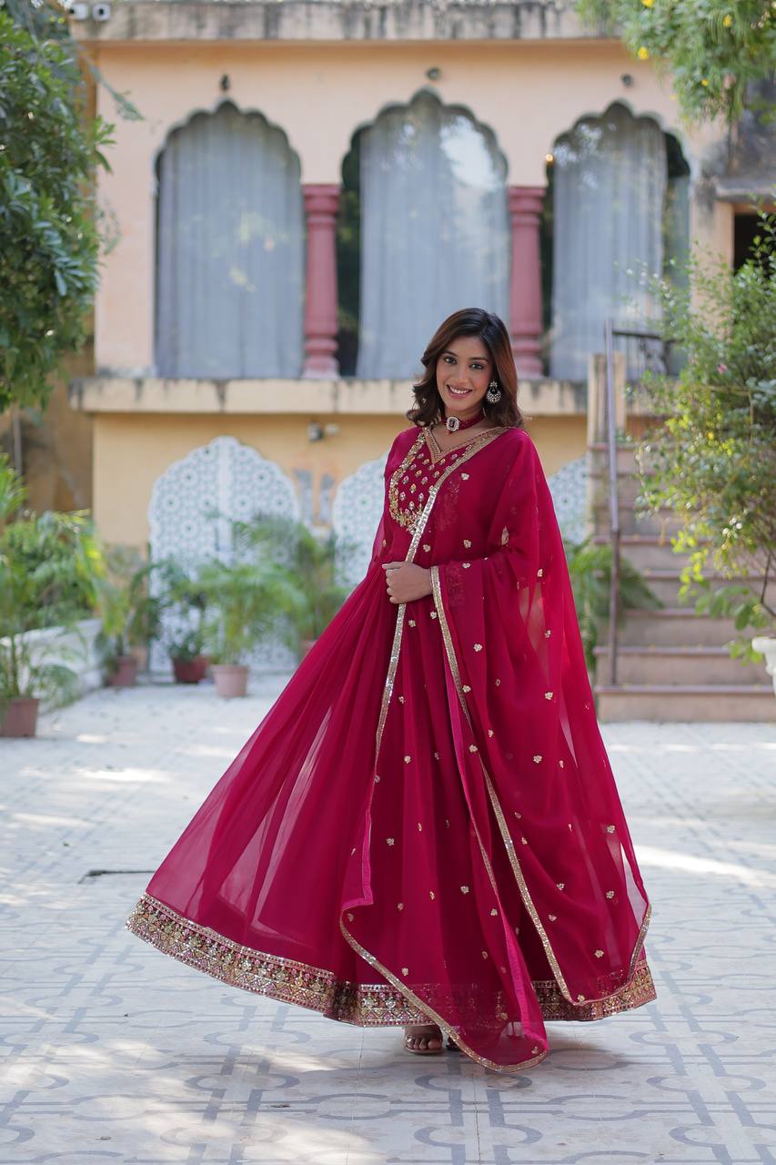 Dark pink faux georgette sequins embroidered flared Gown