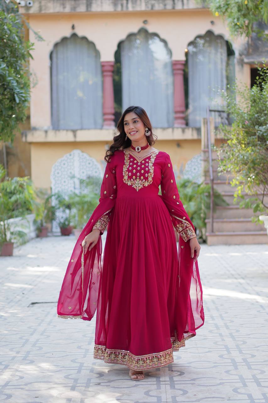 Dark pink faux georgette sequins embroidered flared Gown