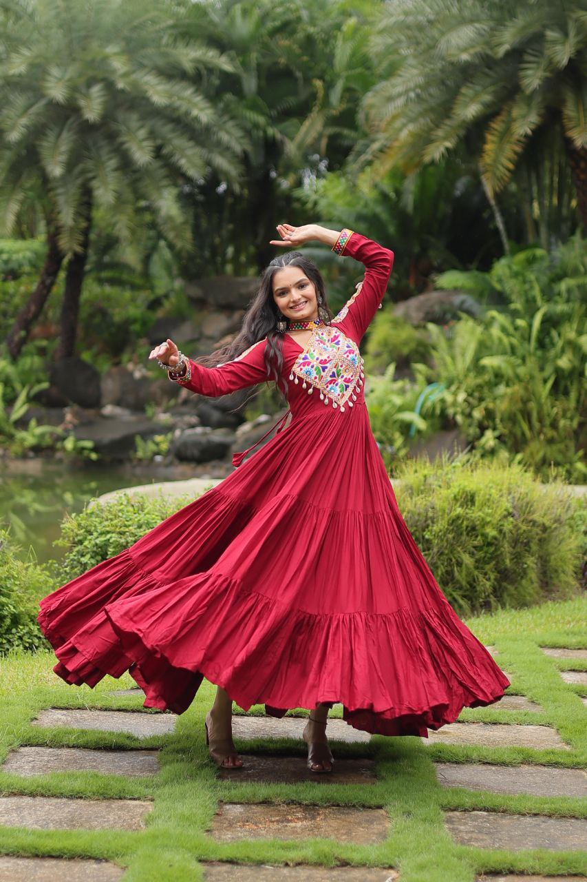 Maroon rayon gown with Kutchi Gamthi embroidered yoke work Gown