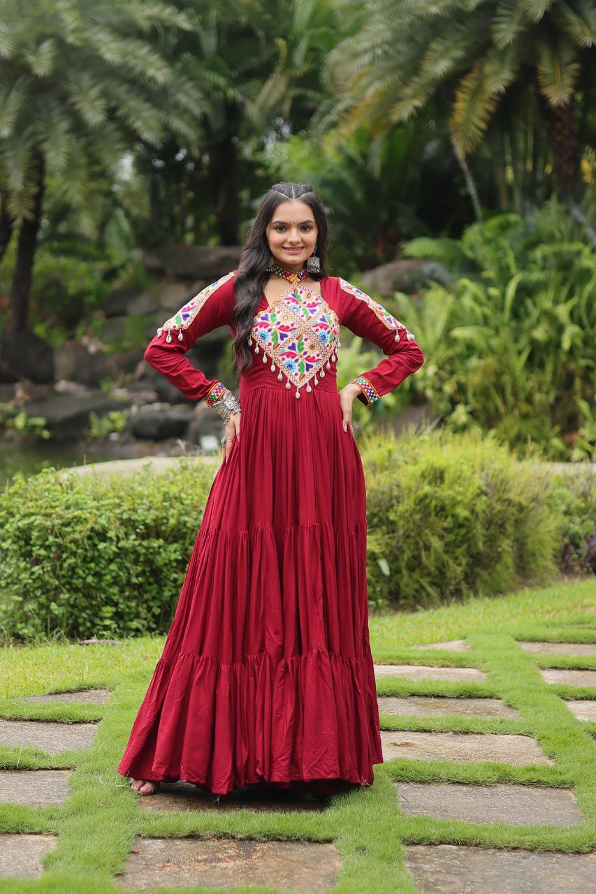Maroon rayon gown with Kutchi Gamthi embroidered yoke work Gown