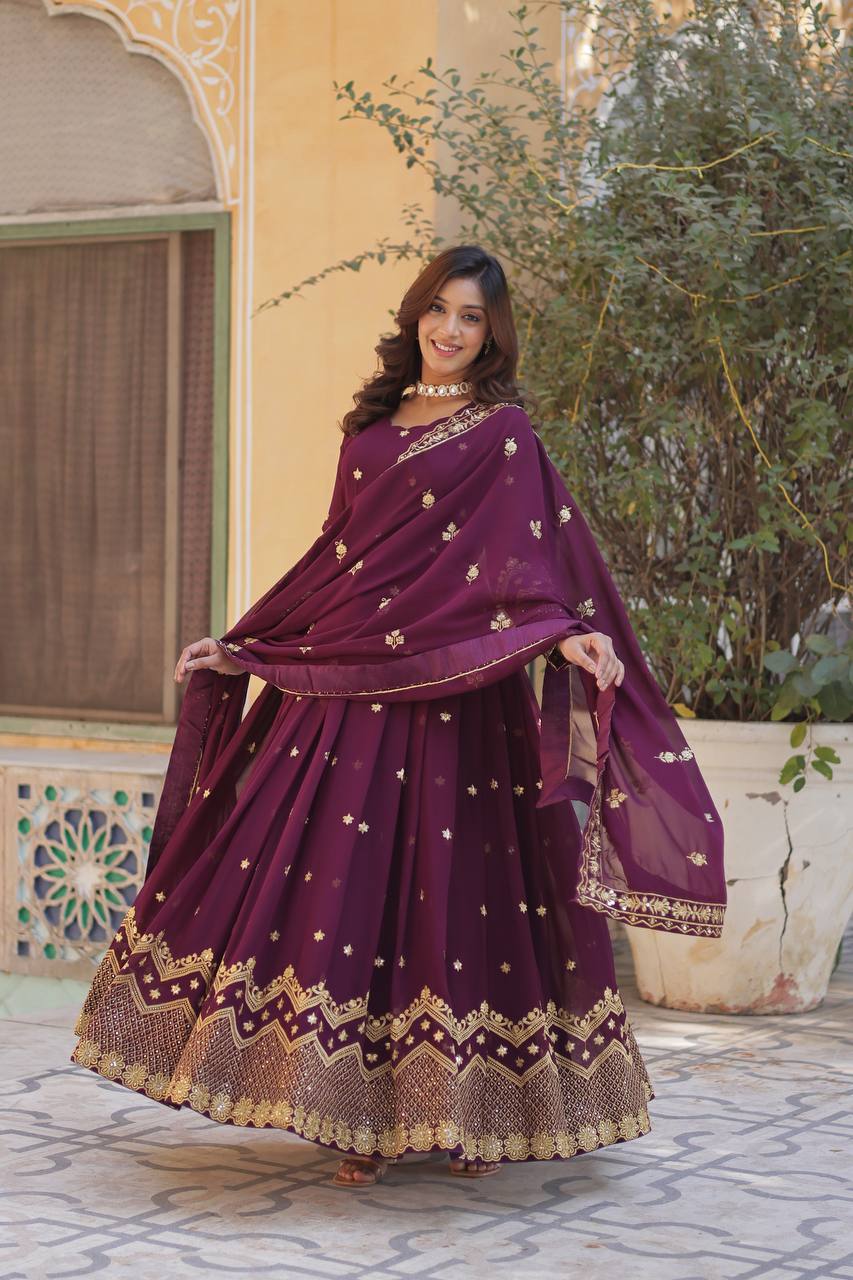 Wine georgette gown with zari and sequins embroidery gown