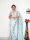 Pastel Blue With Multi-color Floral And Fan Motifs Georgette Ready To Wear Saree With Unstitched Blouse