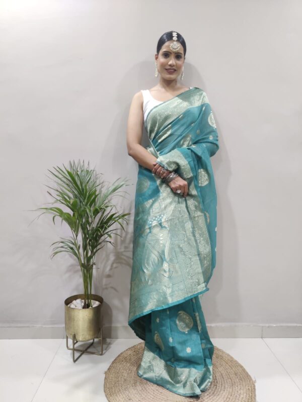 Teal Green Banarasi Silk Silver Zari Weaving And Traditional Motifs Ready To Wear Saree With Unstitched Blouse