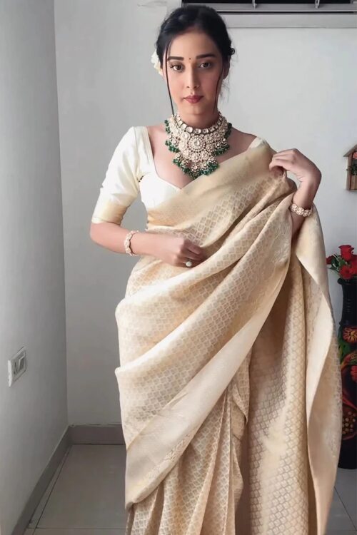 Cream Color Banarasi Silk Silver Zari Weaving And Traditional Motifs Ready To Wear Saree With Unstitched Blouse