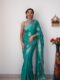 Teal Green Shade Color Banarasi Silk Silver Zari Weaving And Traditional Motifs Ready To Wear Saree With Unstitched Blouse