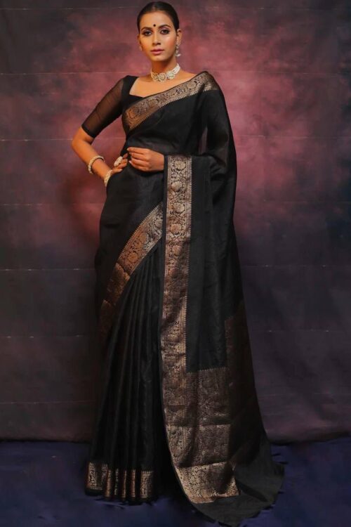 Majestic Black Kanjeevaram Lichi Silk Saree with Antique Gold Zari Border – Timeless Elegance for Evening