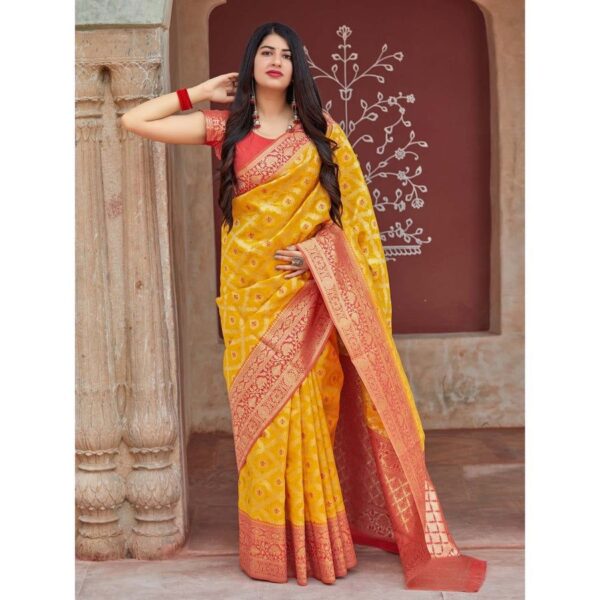 Radiant Yellow Banarasi Silk Saree with Red Zari Border – A Classic Blend of Tradition and Vibrance