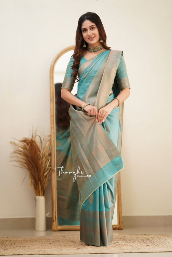 Elegant Teal Blue Soft Lichi Silk Saree with Subtle Woven Motifs and Matching Blouse – Perfect for Graceful Occasions - Image 2