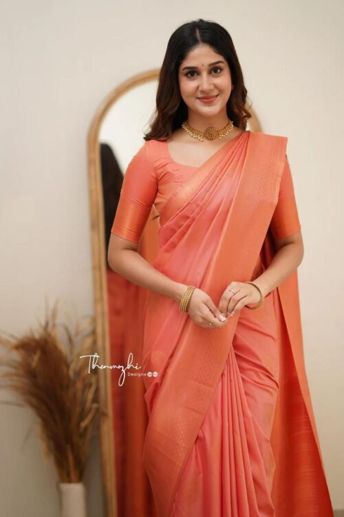 Elegant Soft Orange Soft Lichi Silk Saree with Subtle Woven Motifs and Matching Blouse – Perfect for Graceful Occasions