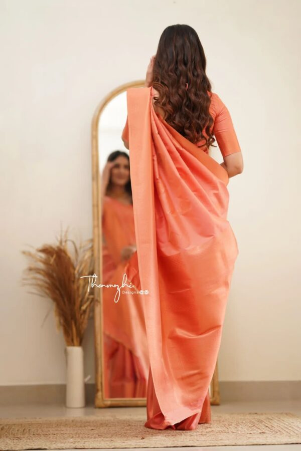 Elegant Soft Orange Soft Lichi Silk Saree with Subtle Woven Motifs and Matching Blouse – Perfect for Graceful Occasions - Image 3