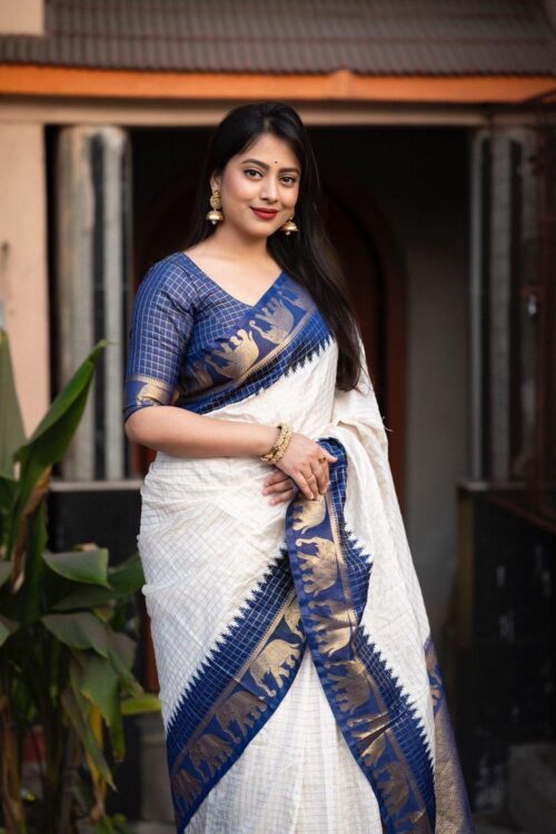 Elegant White Soft Lichi Silk Saree with Blue Zari Elephant Motif Border – Traditional South Indian Charm
